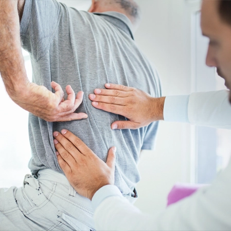 Chiropractic Man With Back Pain