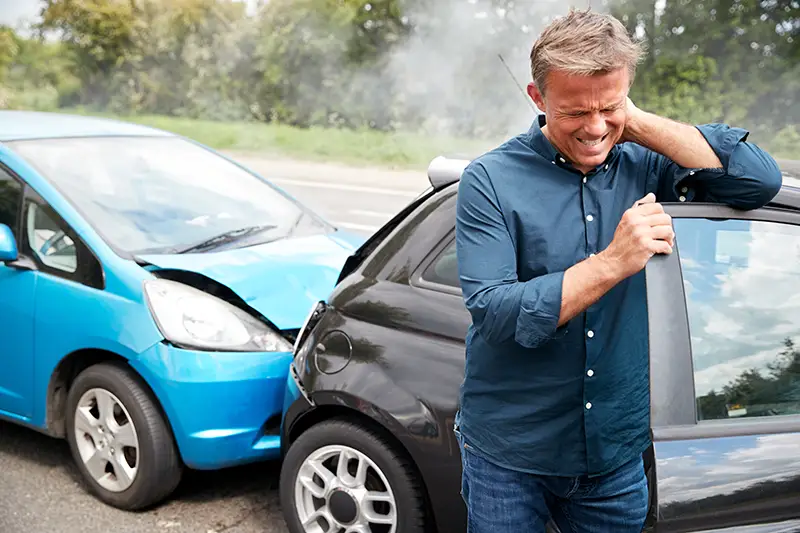 Man after a car accident with neck injury
